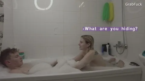 Stimulated her with foot, she shook from orgasm in tub — frame
