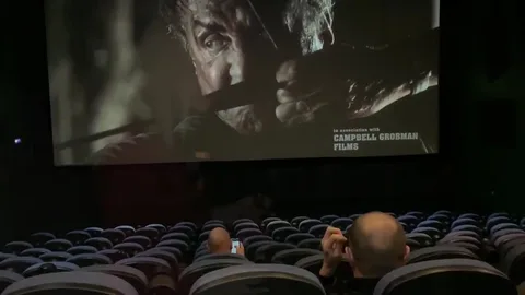 Moscow blonde gives head in movie theater — frame