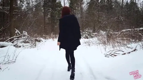 Shameless redhead strips naked in winter forest for sex — frame