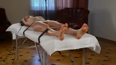 Bound Natasha Andreeva screams and shakes during orgasm — frame