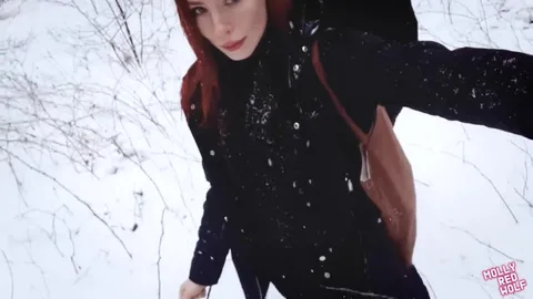 Shameless redhead strips naked in winter forest for sex — frame