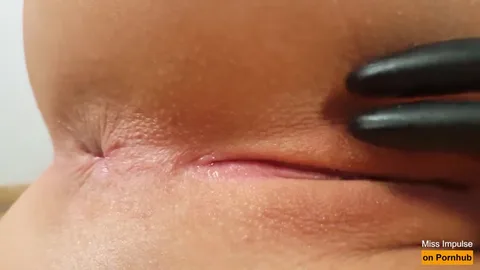 Wet pussy pulses and drips from climax close up — frame