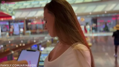 Vibrator in the mall, she cums hard, legs shake — frame