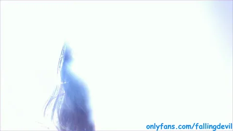 Public squirt on webcam in parking lot — frame