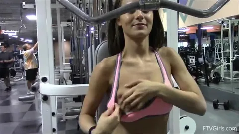Sexy gym girl flashes big tits during workout — frame