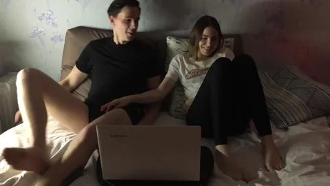 Bored of movie, she grabs his cock under laptop π β frame